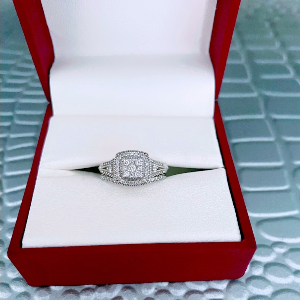 One 10 karat white and rose gold engagement ring w/matching wedding band
